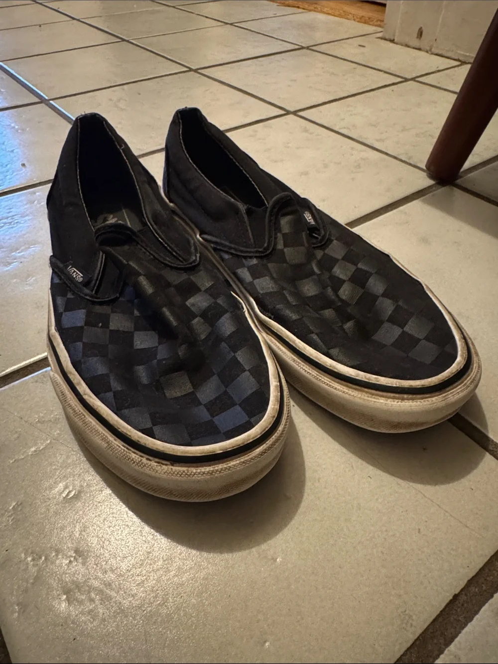 Vans Black Checkerboard Slip-On Sneakers